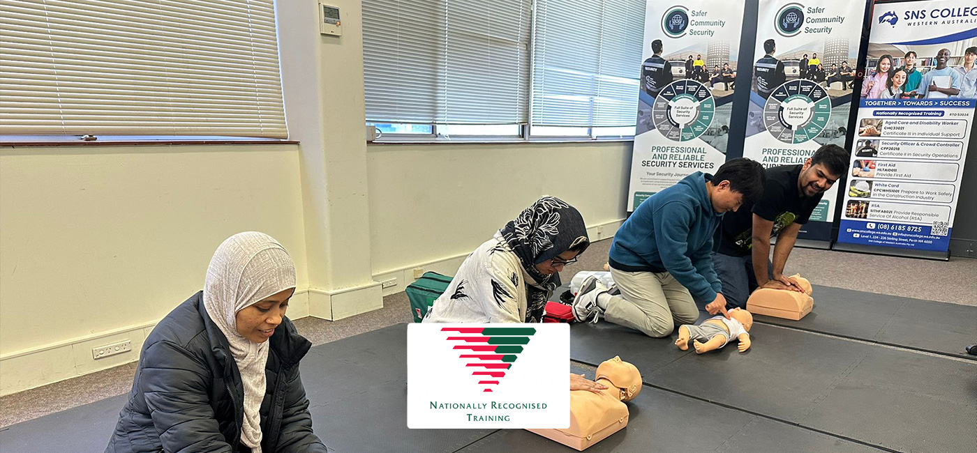 A trainer demonstrating CPR technique during practical first aid training — HLTAID011 Provide First Aid, SNS College Perth