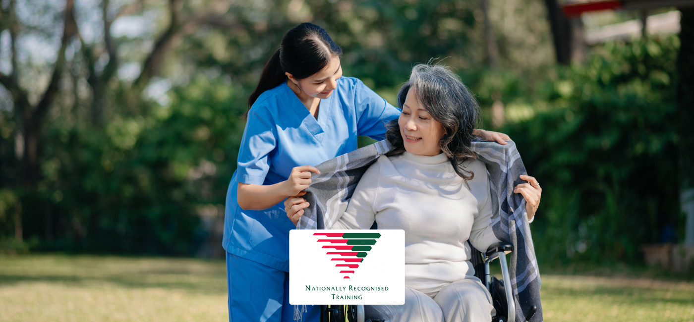 A disability support worker assisting an elderly client outdoors — CHC33021 Certificate III in Individual Support, SNS College Perth