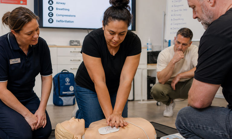 Adult learners practising hands-on skills in a vocational training course